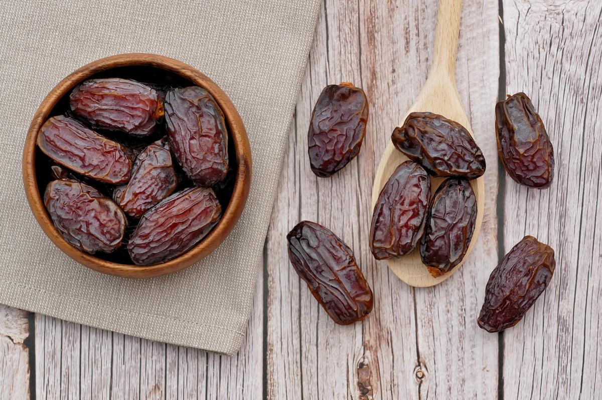 A small serving of dates on a plate