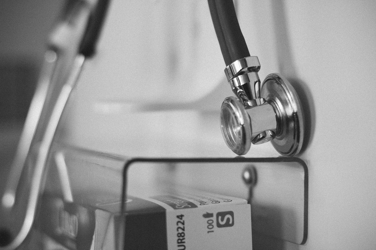 Illustration showing heart health balance with blood pressure cuff and lab test paper
