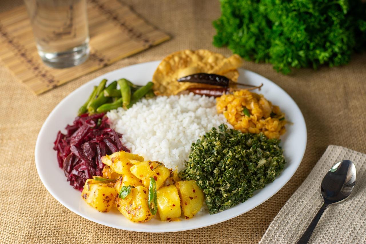 A balanced Pakistani meal with vegetables, protein, daal and a small portion of carbohydrate