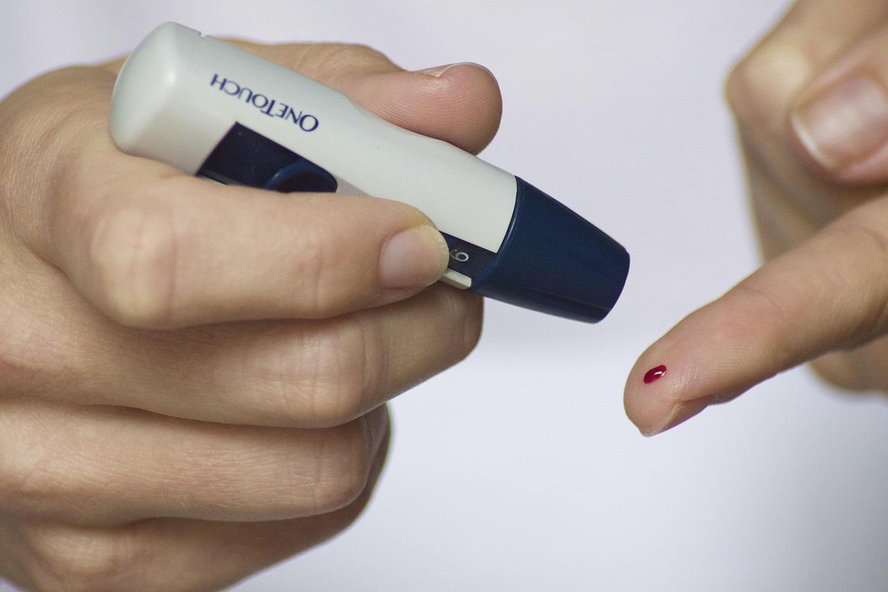 Blood test paperwork showing fasting and random glucose measurements