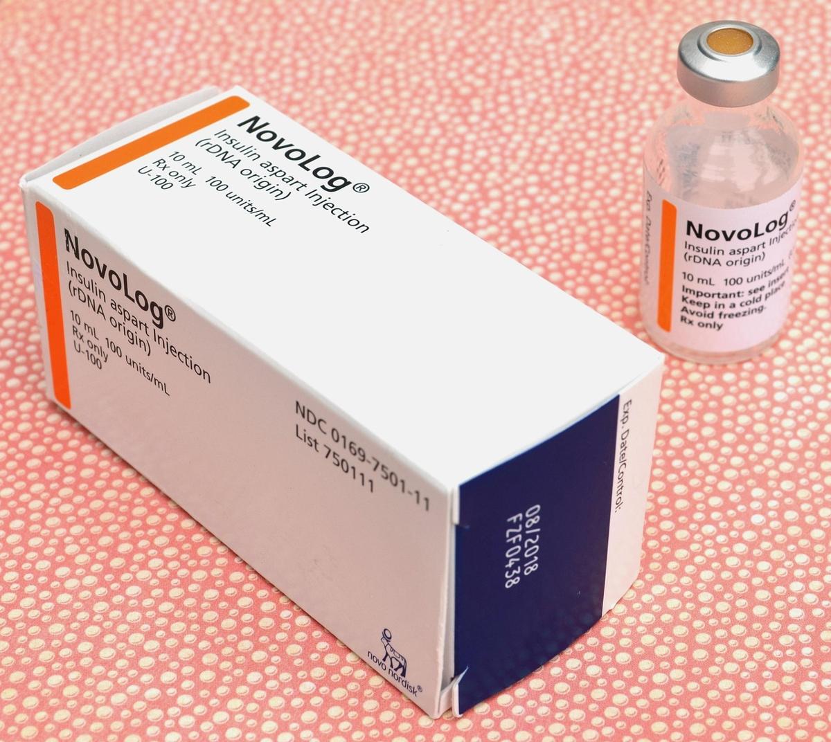 Different insulin pens and vials labeled basal, bolus, and premixed